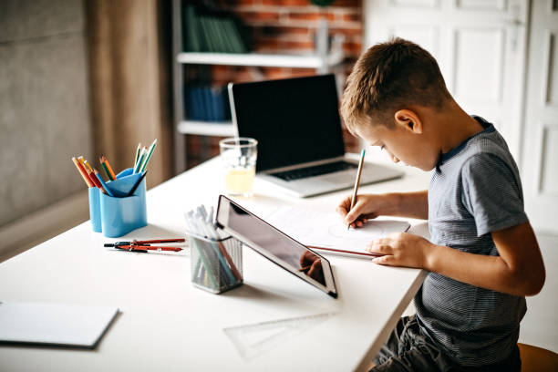 Child doing homework on a tablet